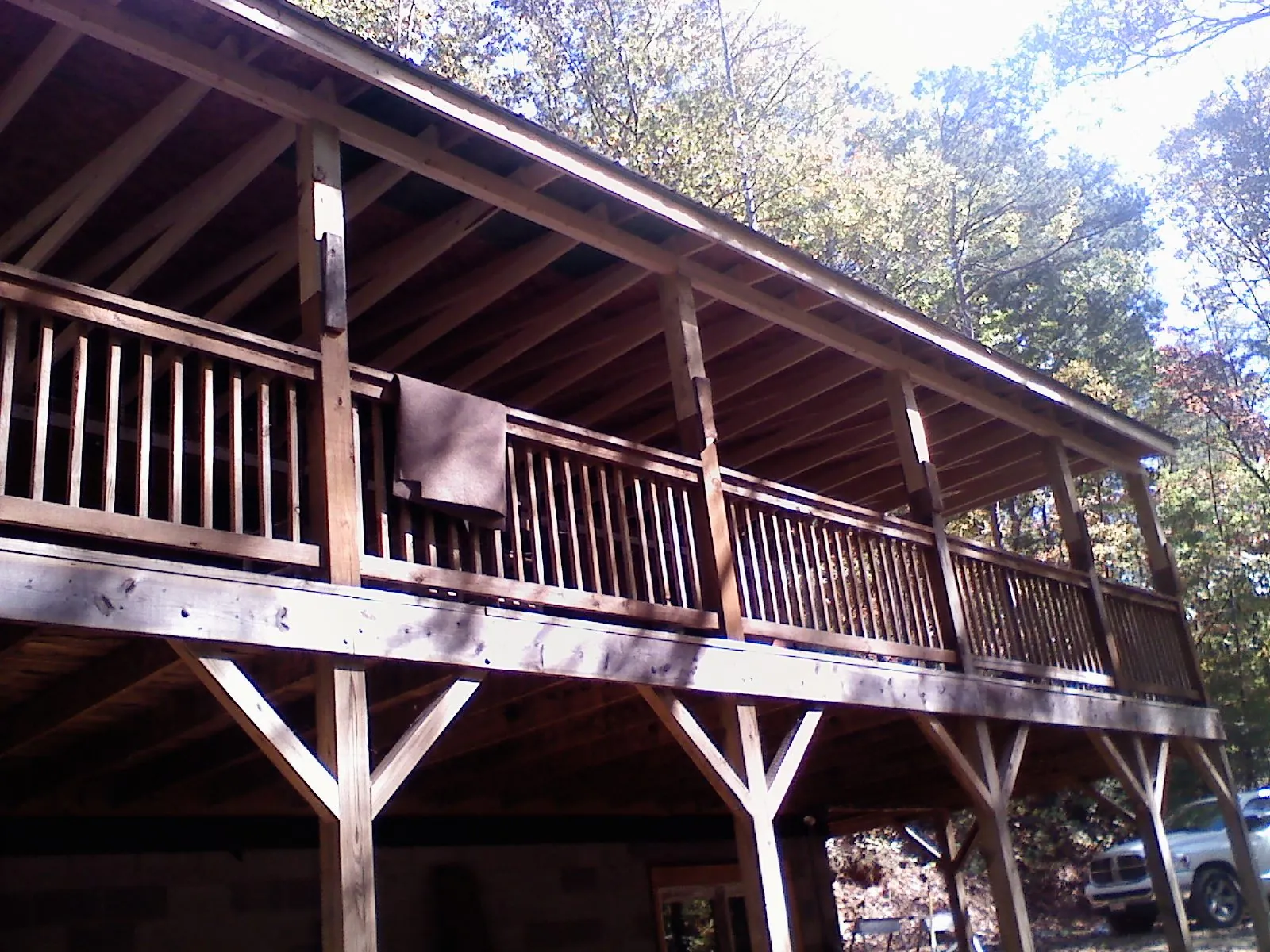 Timber framing under a new elevated porch and deck — Roof Leak Repair in Dana by Roofing Brothers